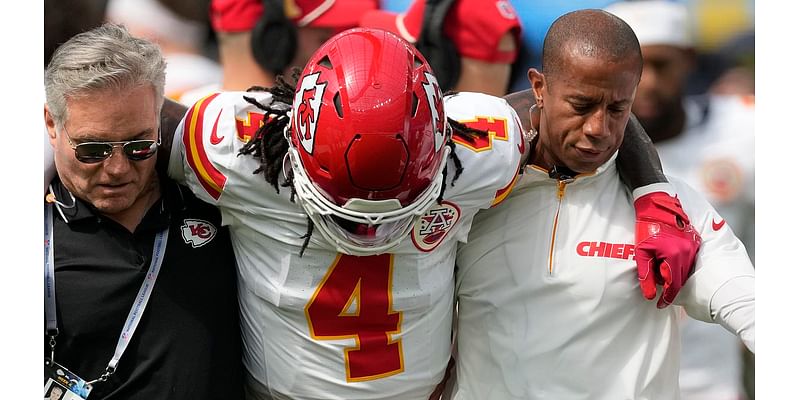 Chiefs star Rashee Rice is carted off on stretcher after collision with Patrick Mahomes in shocking scenes