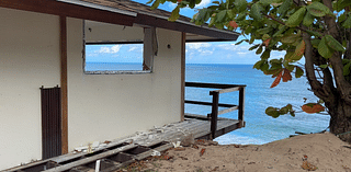 North Shore home hanging on edge as swell set to arrive Monday