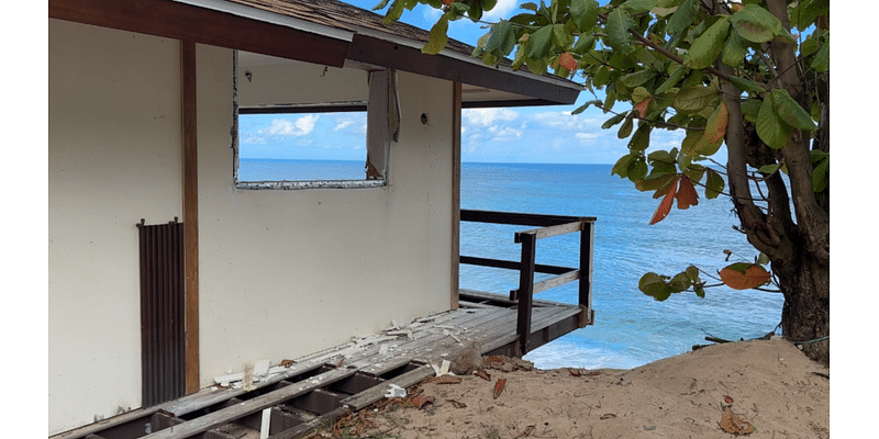 North Shore home hanging on edge as swell set to arrive Monday