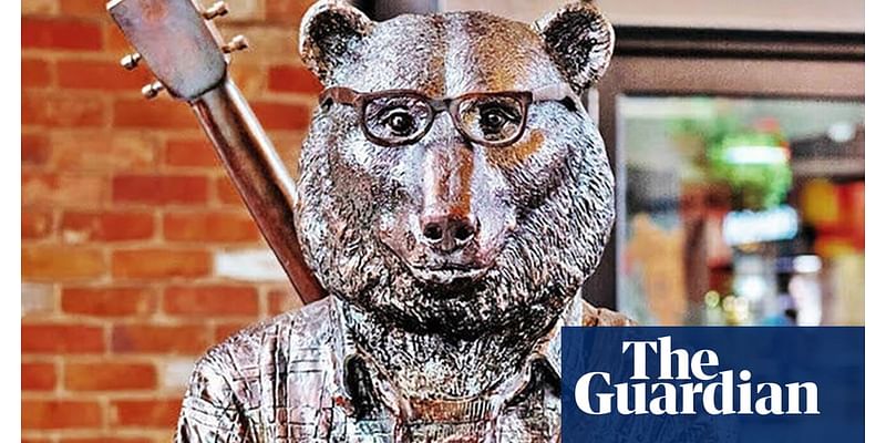 Artists ‘absolutely heartbroken’ after $60,000 bike-riding bear statue stolen from Melbourne laneway