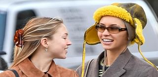 Nepo babies unite as Iris Law wraps up in a quirky yellow winter hat to hit the shops with stylish pal Lila Moss in New York City