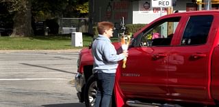 Smiles bloom as local florist hands out free bouquets for Petal It Forward Day