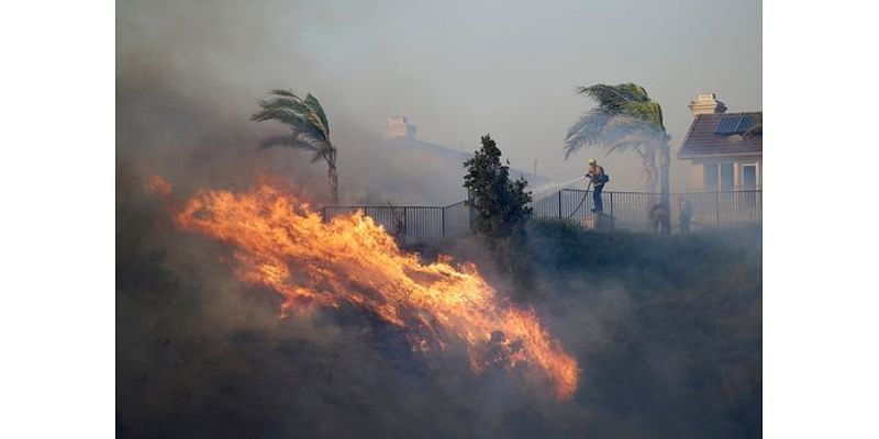 Fast-moving brush fire in Northern California prompts evacuations in a Oakland neighborhood