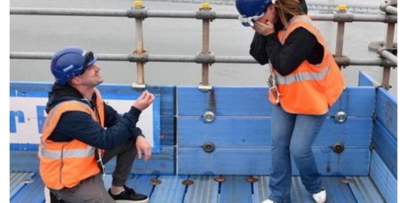 Couple gets engaged 361-feet up on a bridge