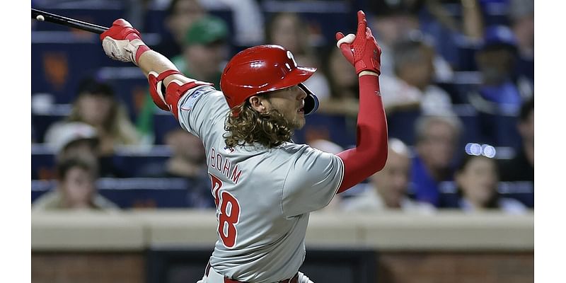 Phillies rout Mets 12-2 behind Bohm to punch playoff ticket and near NL East crown