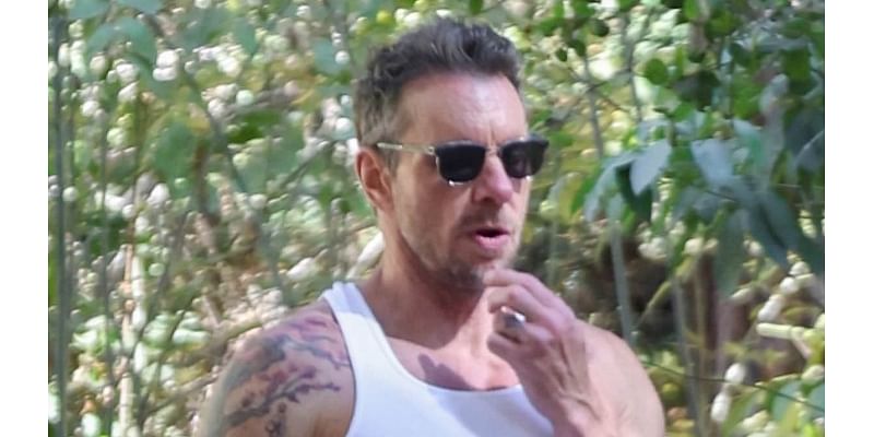 Dax Shepard flashes muscular tattooed arms after wife Kristen Bell's 'shocking' kiss in Nobody Wants This