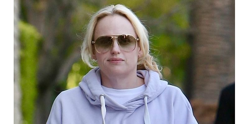 Rebel Wilson keeps a low profile in a grey tracksuit and sunglasses as she steps out in Beverly Hills after tying the knot with wife Ramona Agruma