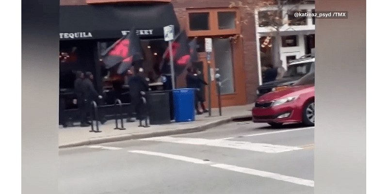 With swastika flags and bellowed slurs, neo-Nazi marchers strode through Columbus. Ohio’s governor and officials condemn it - WSVN 7News