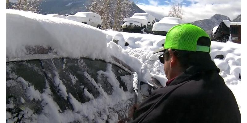 Drivers make unplanned stops at hotels in Colorado's mountains due to troubles on Interstate 70 during snowstorm