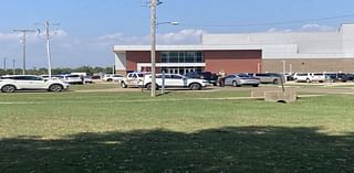 2 students in custody after reports of guns at AR school