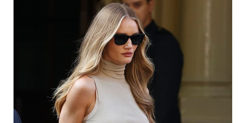 Rosie Huntington-Whiteley goes braless in nude top as she shows off her incredible figure during an outing in London