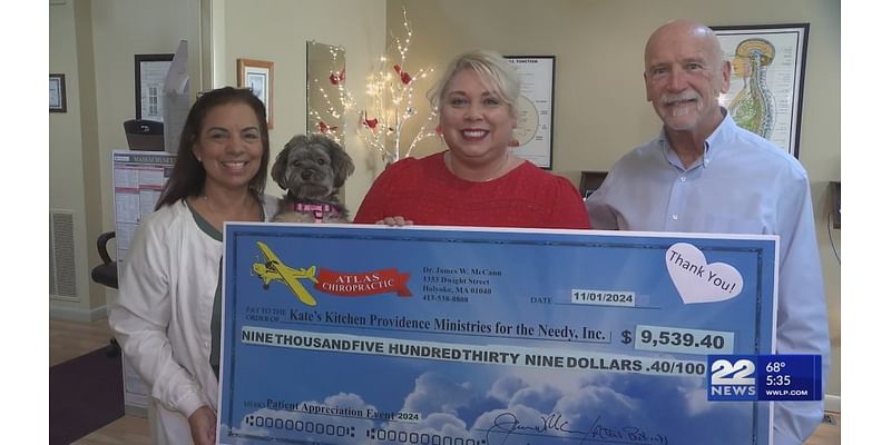 Atlas Chiropractic presents Providence Ministries with check after Patient Appreciation Event