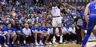 Ighodaro leads No. 4 Marquette to 73-59 rout of top-ranked Kansas in testy Maui semifinal