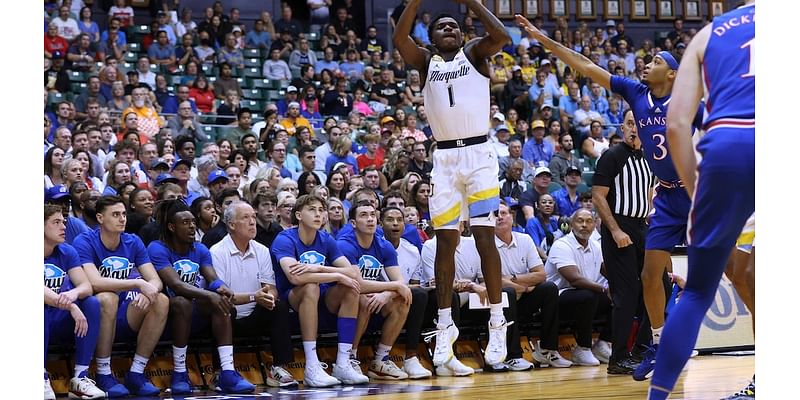 Ighodaro leads No. 4 Marquette to 73-59 rout of top-ranked Kansas in testy Maui semifinal