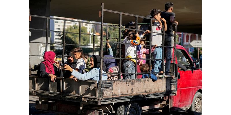 Thousands flee Israel airstrikes on Lebanon with what little they can: ‘We’re afraid for a big war’