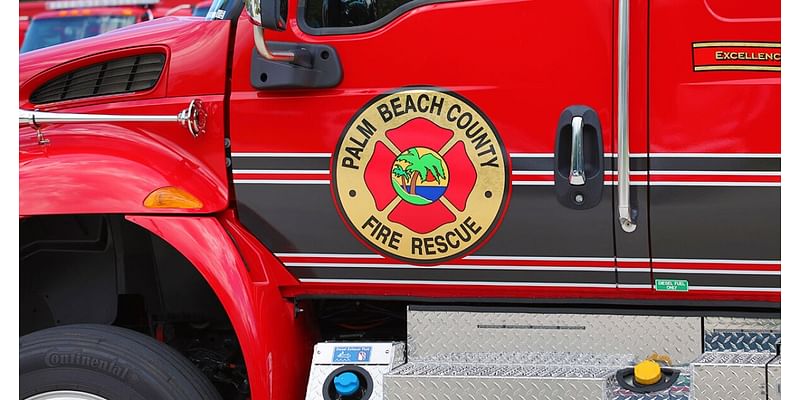 Palm Beach County Fire Rescue respond to car in canal in west Boca