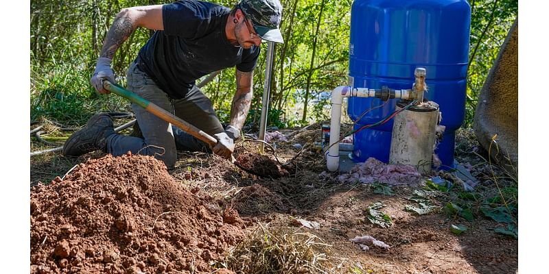 After hurricane, with no running water, residents organize to meet a basic need