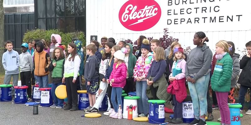 Students serenade voters at Burlington polling place