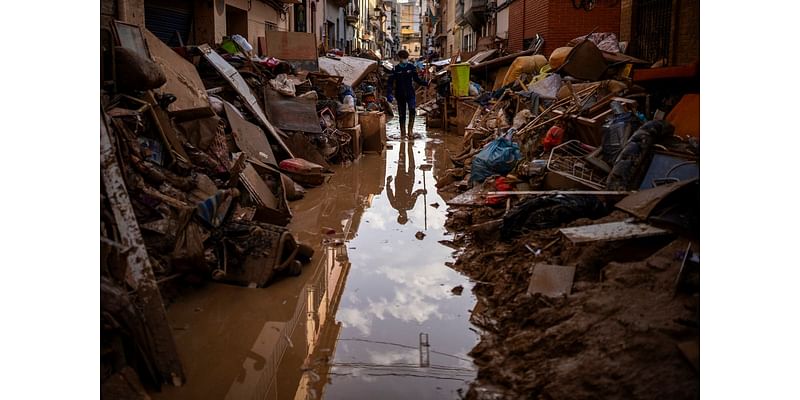 A week after Spain's floods, families hold out hope that loved ones are not among the dead