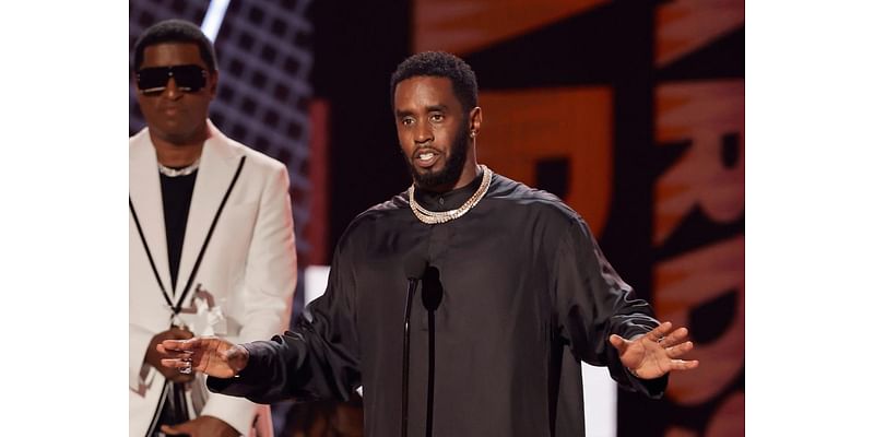 Sean ‘Diddy’ Combs Seen Leaving Hotel in Handcuffs in Newly Surfaced Arrest Video