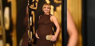 Mother-To-Be Jennifer Lawrence Donned A Draped Gown With Gold Accents That Had Her Baby Bump On Display