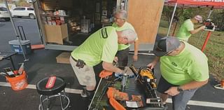 Volunteers use chainsaws to bring people together following storm aftermath