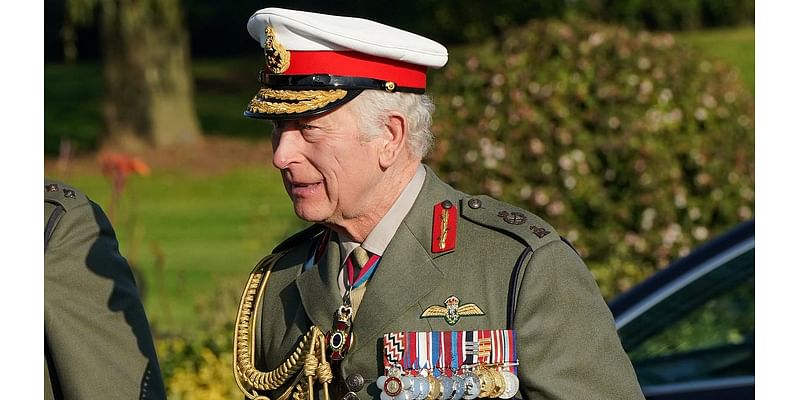 Commando King! Charles takes a trip down memory lane on visit to a Royal Marine centre where he trained as a helicopter pilot in 1974