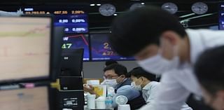 Shares Slip in Asia After Quick Spike