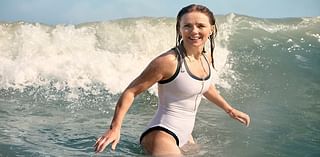 Geri Horner, 52, shows off her incredible figure in a white swimsuit as she enjoys a dip in the sea