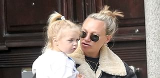 Chloe Madeley is in high spirits as she visits a toy shop with her daughter Bodhi, two, and blows bubbles outside