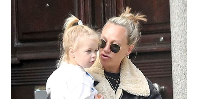 Chloe Madeley is in high spirits as she visits a toy shop with her daughter Bodhi, two, and blows bubbles outside