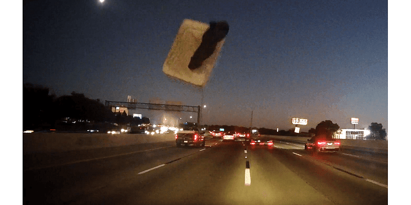 Mattress flies off truck on I-10, narrowly missing driver