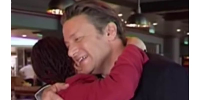 Jamie Oliver embraces Aboriginal advocate in touching moment during Narelda Jacobs interview after he pulled 'offensive' children's book from shelves: 'It's been very painful'