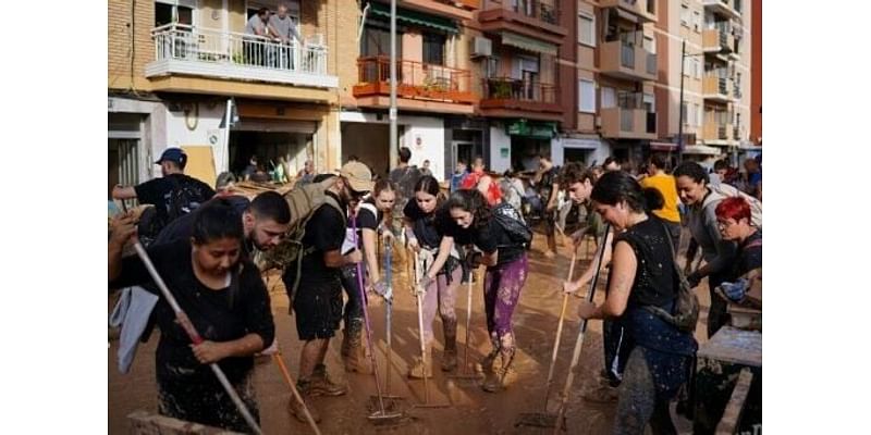 Spain's young flood helpers smash 'snowflake' stereotype