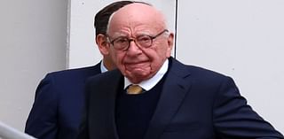 Media mogul Rupert Murdoch is all smiles as he enters court with his heir apparent Lachlan on second day of battle over News Corp empire