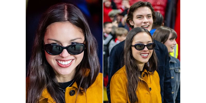 Olivia Rodrigo Wears Dainty ‘L’ Necklace for Boyfriend Louis Partridge on Couple’s Sporty Date in Manchester