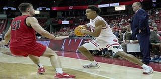 Wisconsin digs out of early hole, buries Holy Cross 85-61