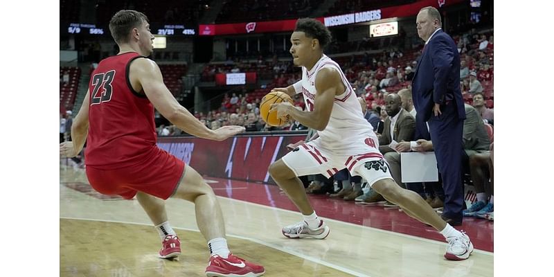 Wisconsin digs out of early hole, buries Holy Cross 85-61