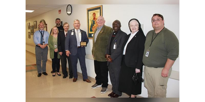 The West Virginia Knights of Columbus present an icon of St. Joseph to WVU Medicine St. Joseph’s Hospital