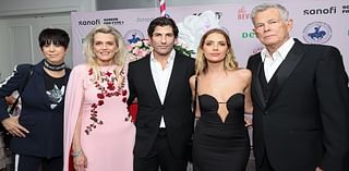 Ashley Benson models a low-cut dress as she poses with husband Brandon Davis at his grandmother's charity gala that raises almost $2M