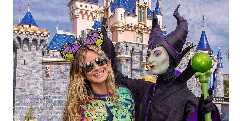 Heidi Klum gets soaked after trading red carpets for rafts during fun day out at California's Disneyland Park with husband Tom Kaulitz