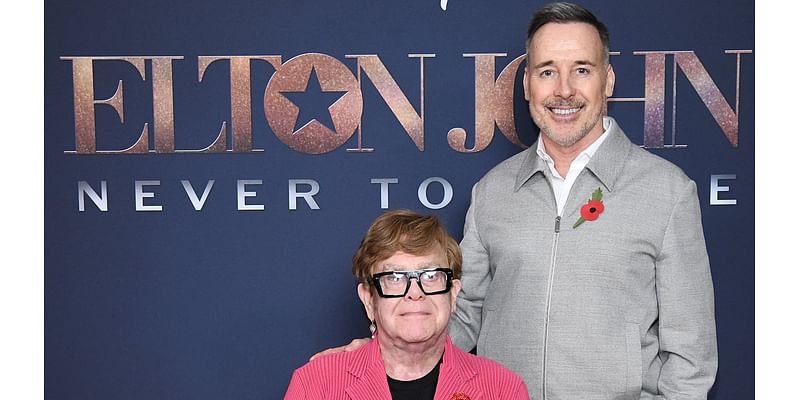 Elton John, 77, is proudly supported by his husband David Furnish, 62, as they attend a special screening of his new biopic Never Too Late at The Ham Yard Hotel in London