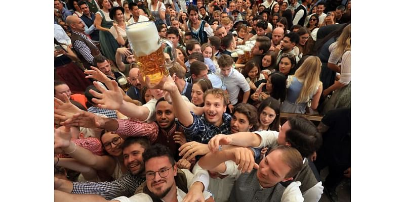 Oktoberfest under way in Munich after ceremonial keg-tapping