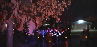 Candlelight walk honors Duluth murder-suicide victims