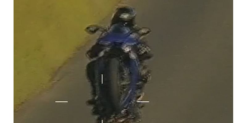 Shocking moment biker pulls 111mph wheelie on the wrong side of the road while carrying a passenger - as he avoids jail