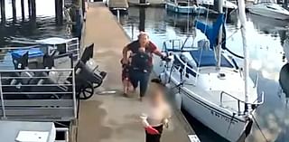 Chilling new video shows otter stalking family down dock where child was dragged under water in horrific attack