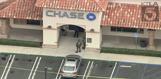 Elementary school placed on lockdown after shot fired during Orange County bank robbery