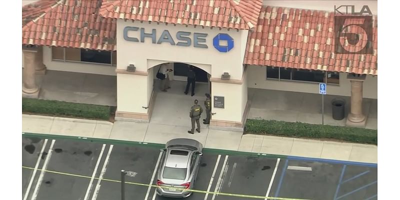 Elementary school placed on lockdown after shot fired during Orange County bank robbery