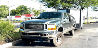 Police searching for stolen Ford Excursion vehicle