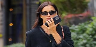 Irina Shayk is chic in Chanel as she wraps up in a faux fur-trimmed coat and totes $10K handbag during a dog walk in NYC - days after her sizzling Victoria's Secret runway appearance